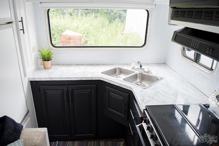 Our DIY Camper Kitchen Makeover – Painting Oak Cabinets