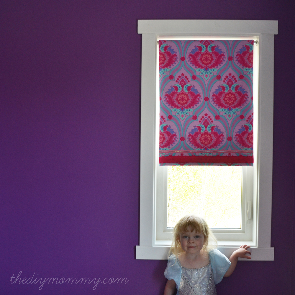 DIY No-Sew Fabric Covered Blackout Roller Blinds by The DIY Mommy. Just use spray adhesive, fabric and ribbon for an exciting update to your roller blinds!