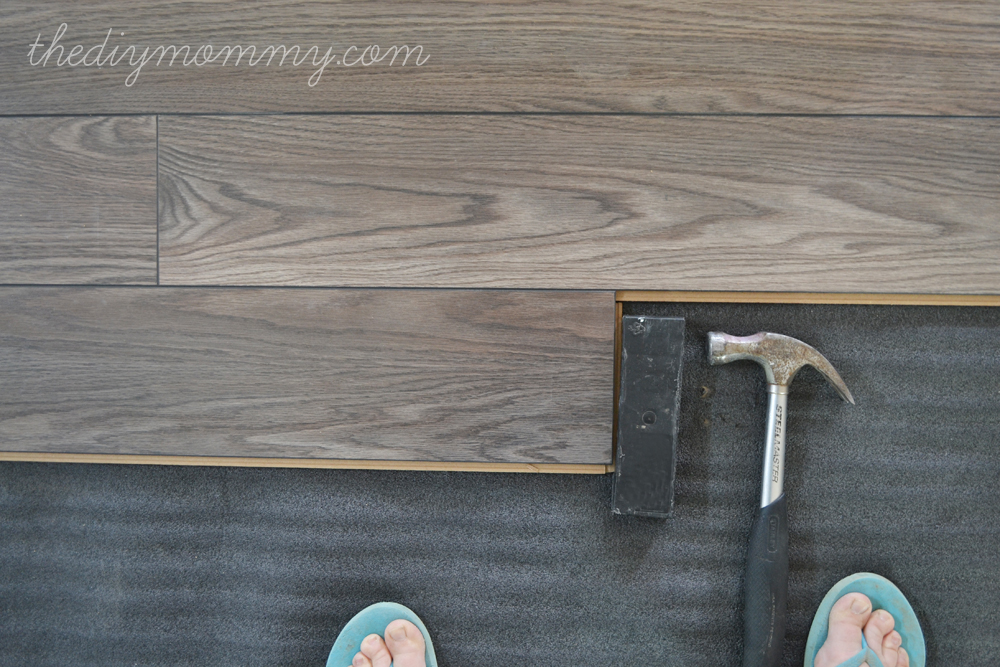 Installing Laminate Flooring by The DIY Mommy. (Allen + Roth Provence Oak Laminate from Lowe's Canada)