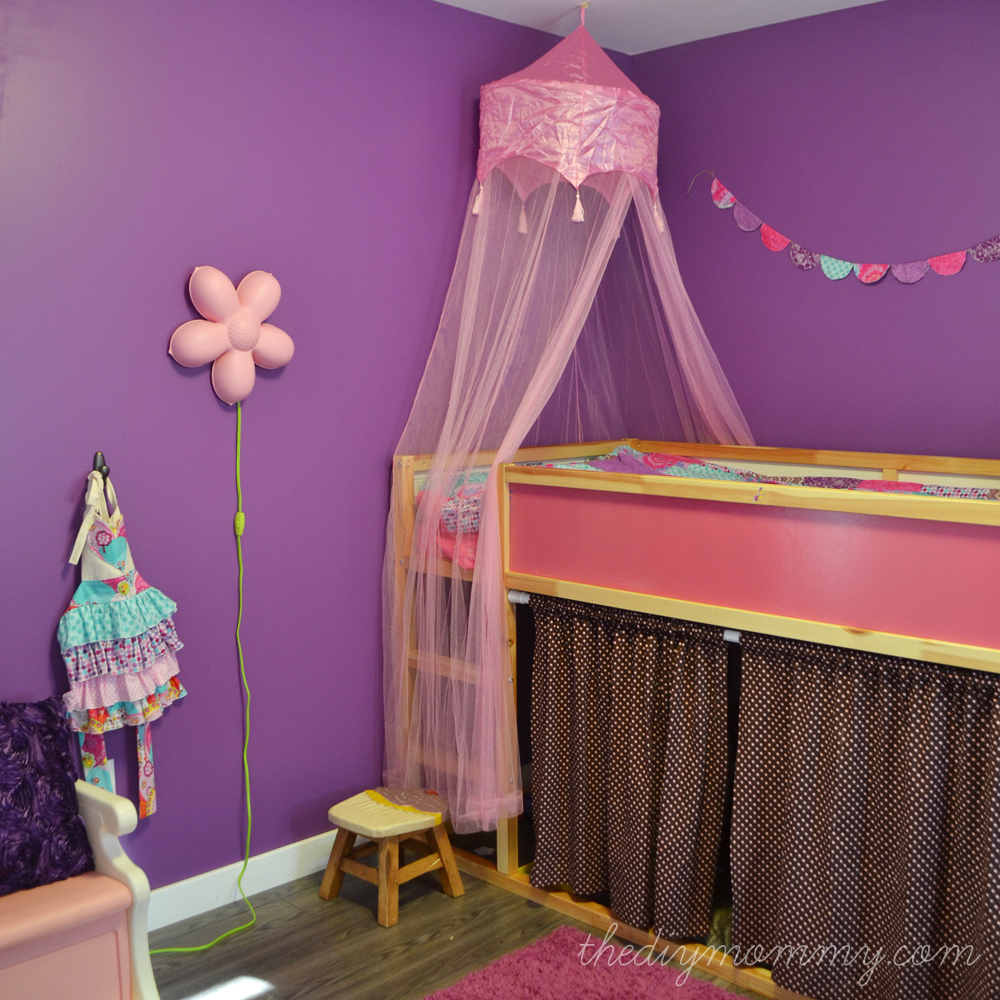 A bright jewel toned kid's room in purple, hot pink and turquoise - The DIY Mommy