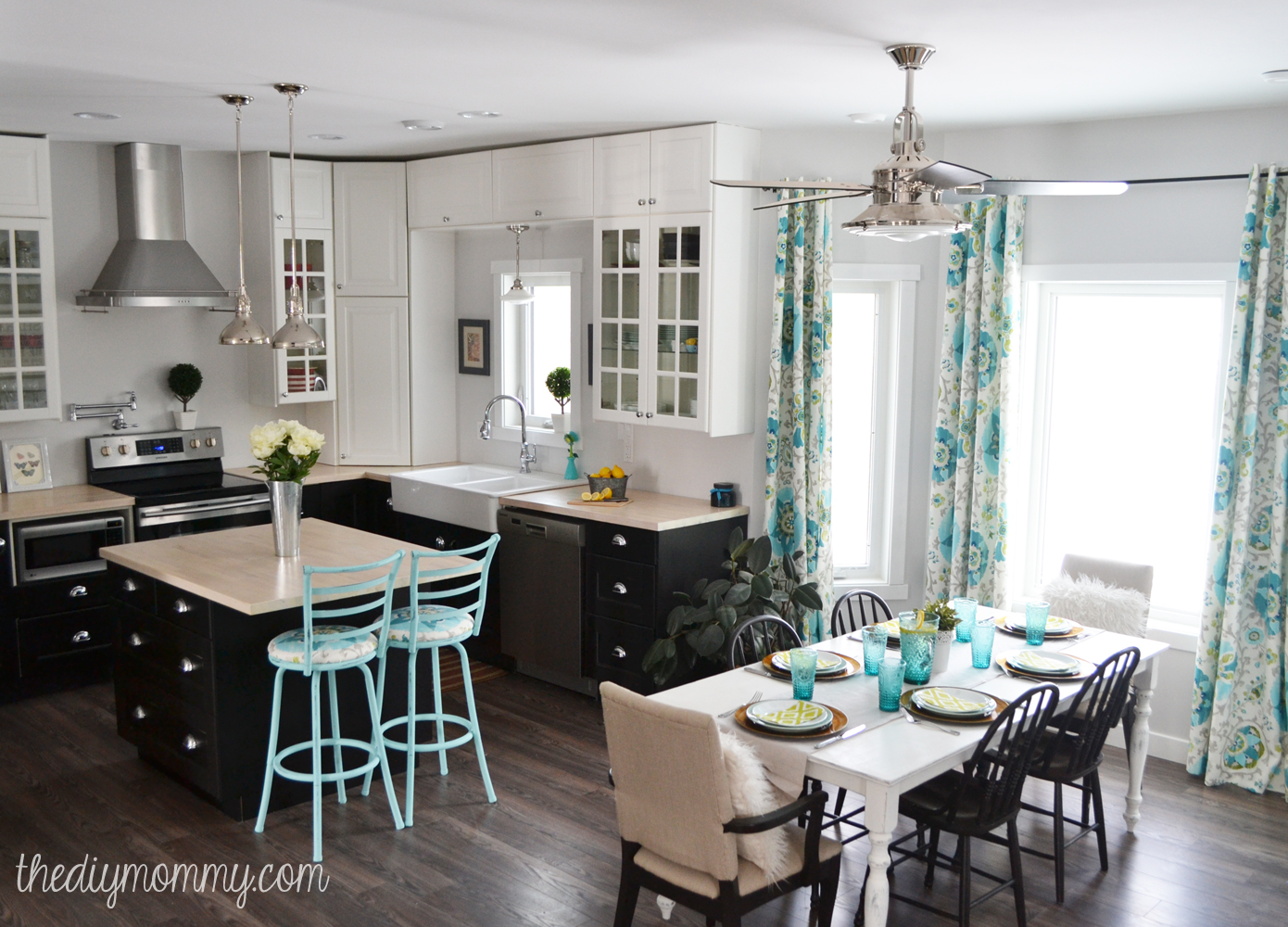 A black, white & turquoise vintage industrial kitchen filled with budget friendly DIY ideas.