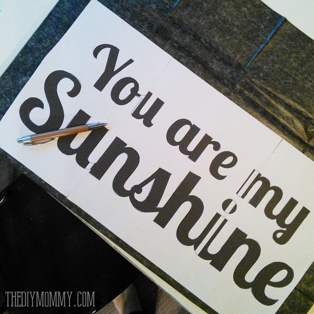 How to make a DIY rustic wooden sign - such a cute You Are My Sunshine sign!
