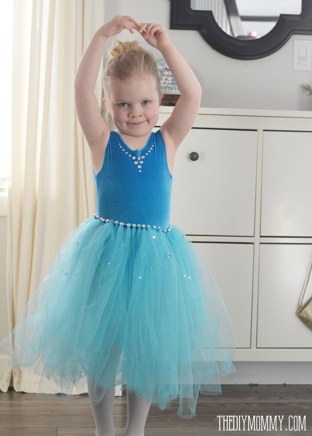 An easy DIY Frozen inspired dance costume complete with a bodysuit and tutu.
