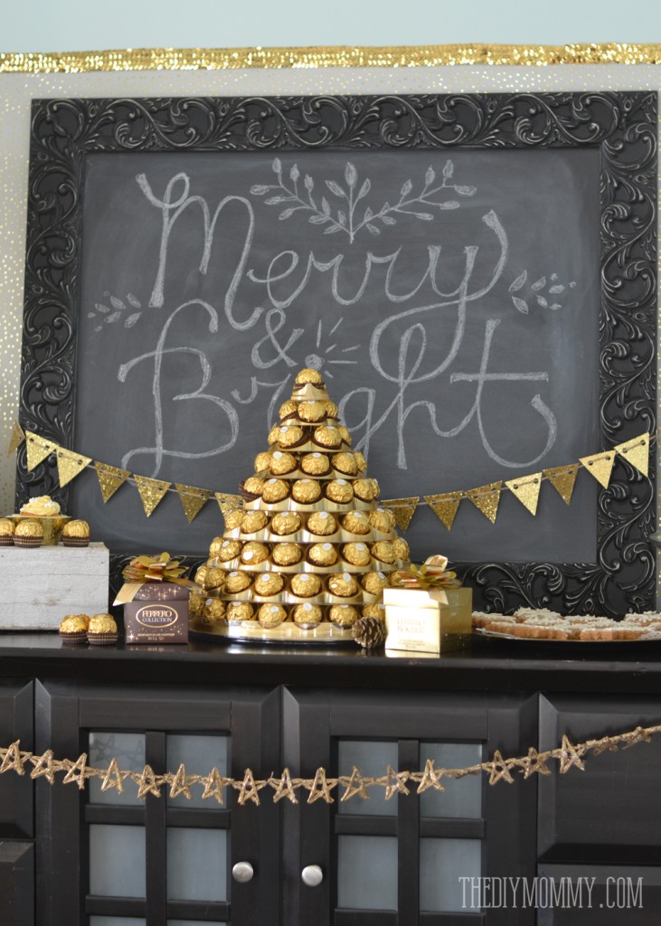 Gold and black glamorous Christmas or New Year's dessert table with Ferrero Rocher