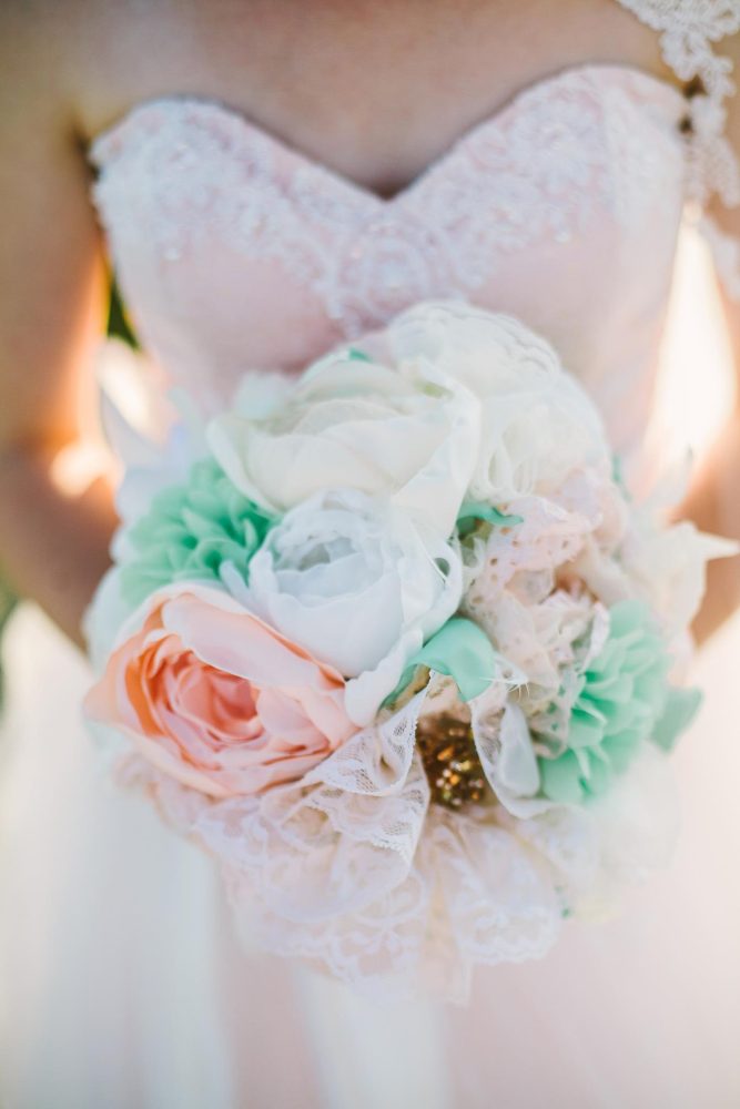 How to make this absolutely gorgeous, realistic looking DIY bridal bouquet made out of handmade fabric flowers, brooches, keys and pins.