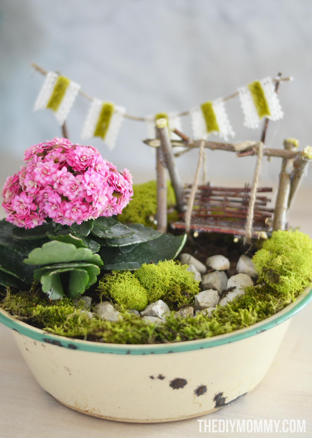 How to make a DIY mini fairy garden gift in a vintage enamelware planter.