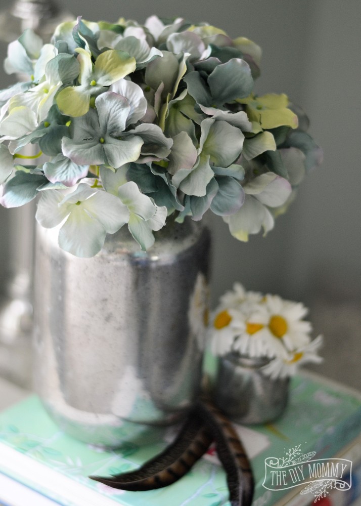 How to make faux mercury glass vases from recycled jars - this method doesn't use a water + vinegar spray prior to the spray paint!