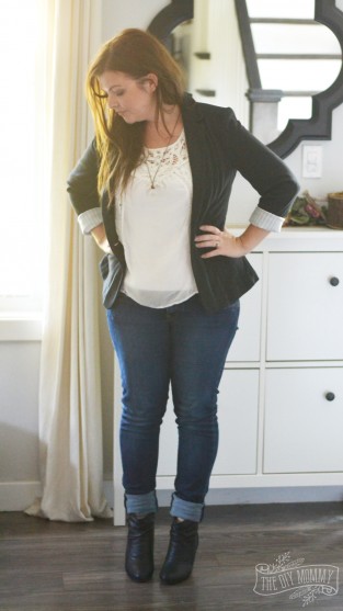 Petite Curvy Mom Style: Black blazer, lace top, jeans, black booties.