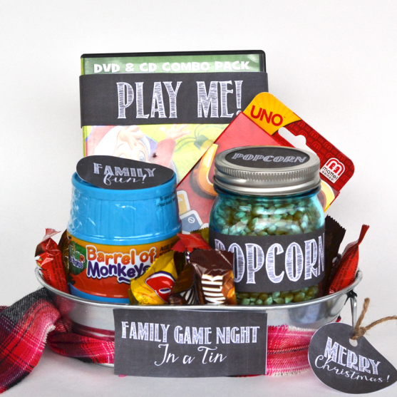 A Gift In A Tin: Family Game Night in a Tin. Ideas on what to include + free printables! A great Christmas or anytime gift. www.thediymommy.com
