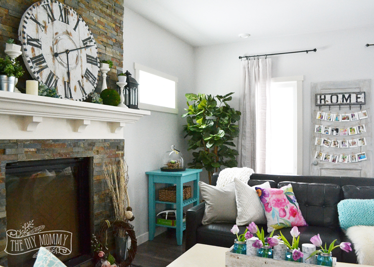 A traditional black and white living room with pops of bright color for Spring