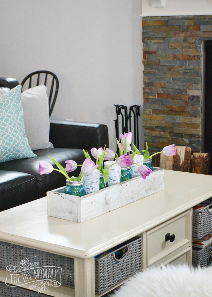 A traditional black and white living room with pops of bright color for Spring