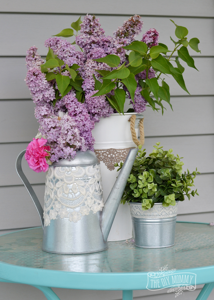 Embellish garden planters and watering cans with lace and Mod Podge