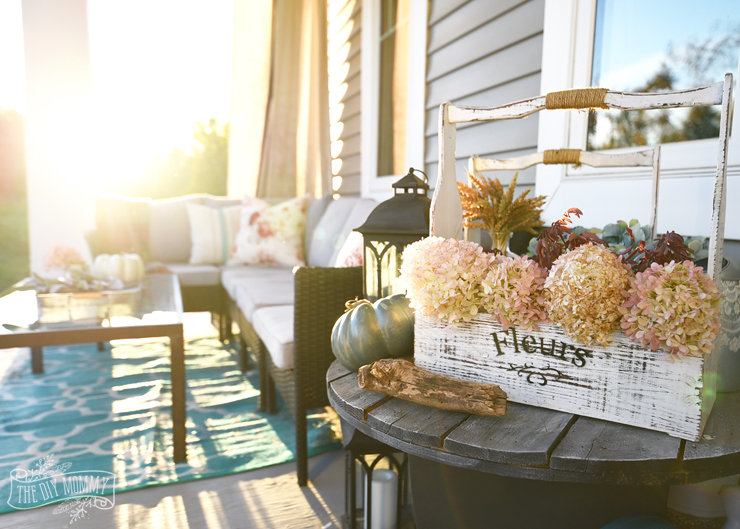 Colorful country boho farmhouse porch decor for Fall in pinks, reds, teals and grays