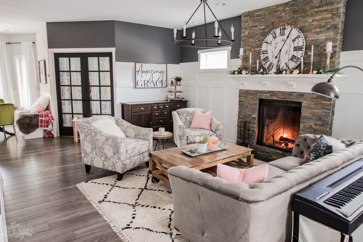 A cozy, rustic glam traditional living room in black, white, grey & pink