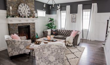 A cozy, rustic glam traditional living room in black, white, grey & pink