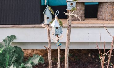 Adorable birdhouse feature you can make with dollar store and salvaged items for your garden!