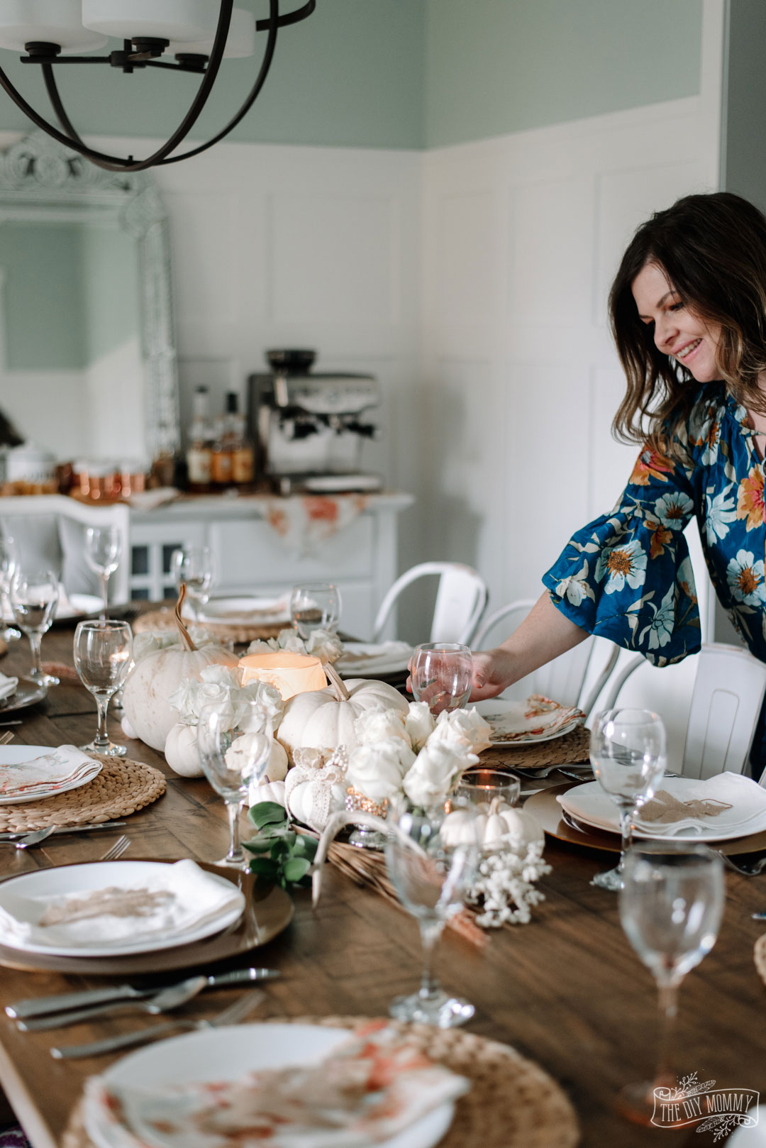 Elegant, romantic Thanksgiving tablescape idea for 12 in whites, creams and a mix and match style
