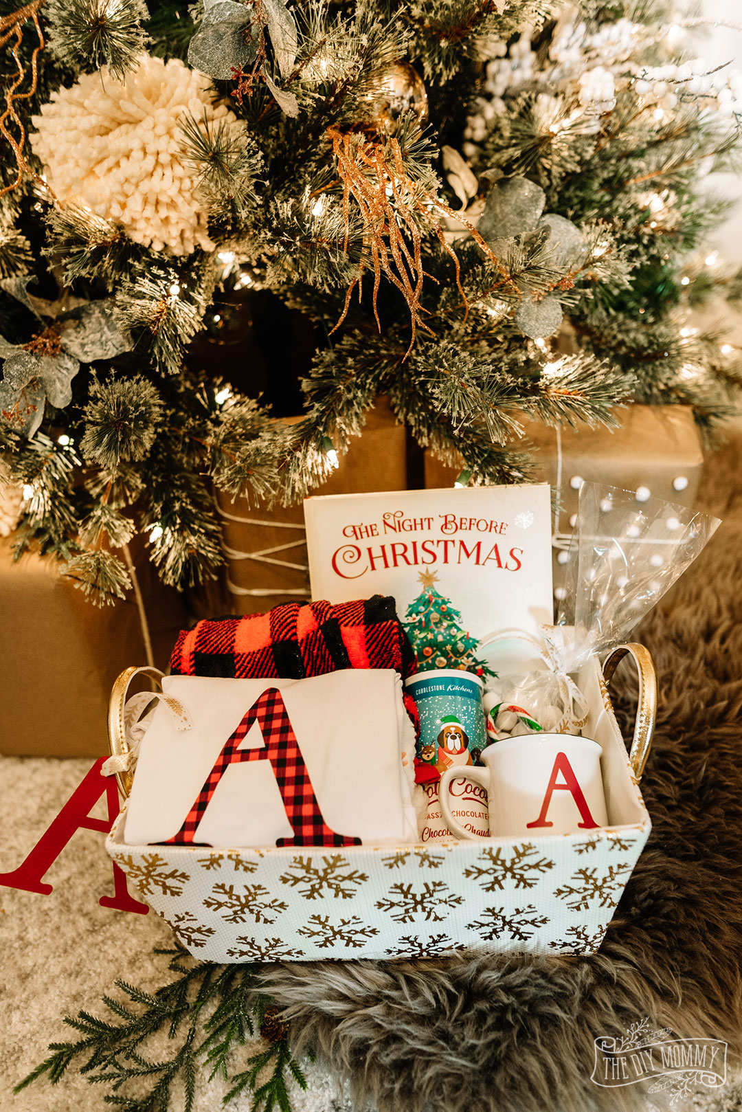 Learn how to make a personalized Christmas Eve box, what goes in a Christmas Eve box, and why you should do it