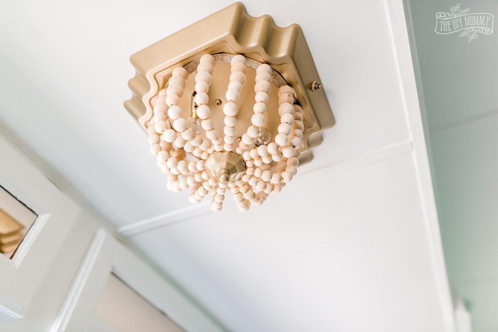 See how I transformed a flush mount fixture in our camper with this ceiling light DIY $7 boho makeover!