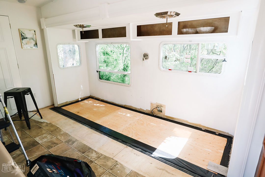 Install Vinyl Plank Flooring in an RV with a Pull Out | Our DIY Camper 2.0  | The DIY Mommy