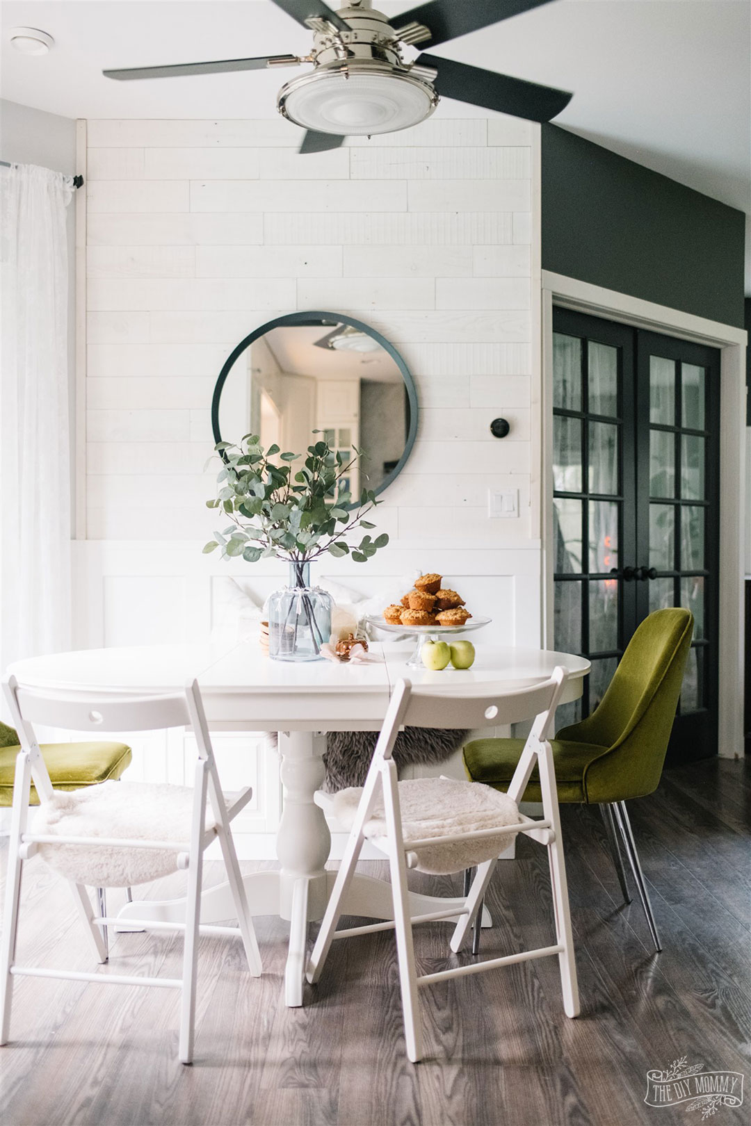 Green, white and natural breakfast nook decorated for Fall