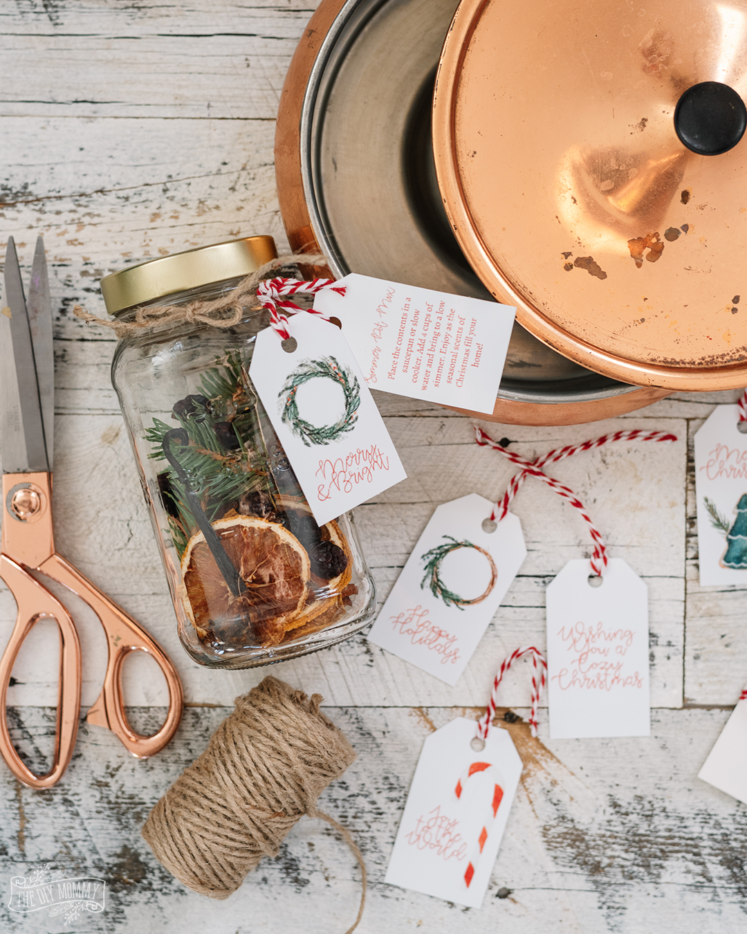 Budget friendly DIY simmer pot with dried fruit, spices and greenery and some handmade tags! I'm sure any teacher will love this simple but meaningful Christmas gift idea. 