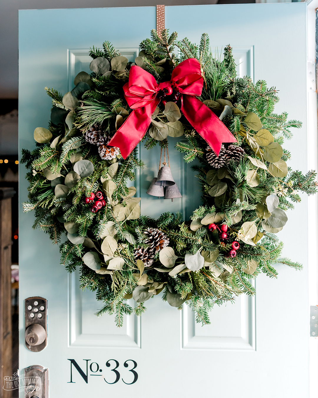 Learn how to put together a fresh greenery Christmas wreath that looks full and gorgeous with this easy wreath hack!