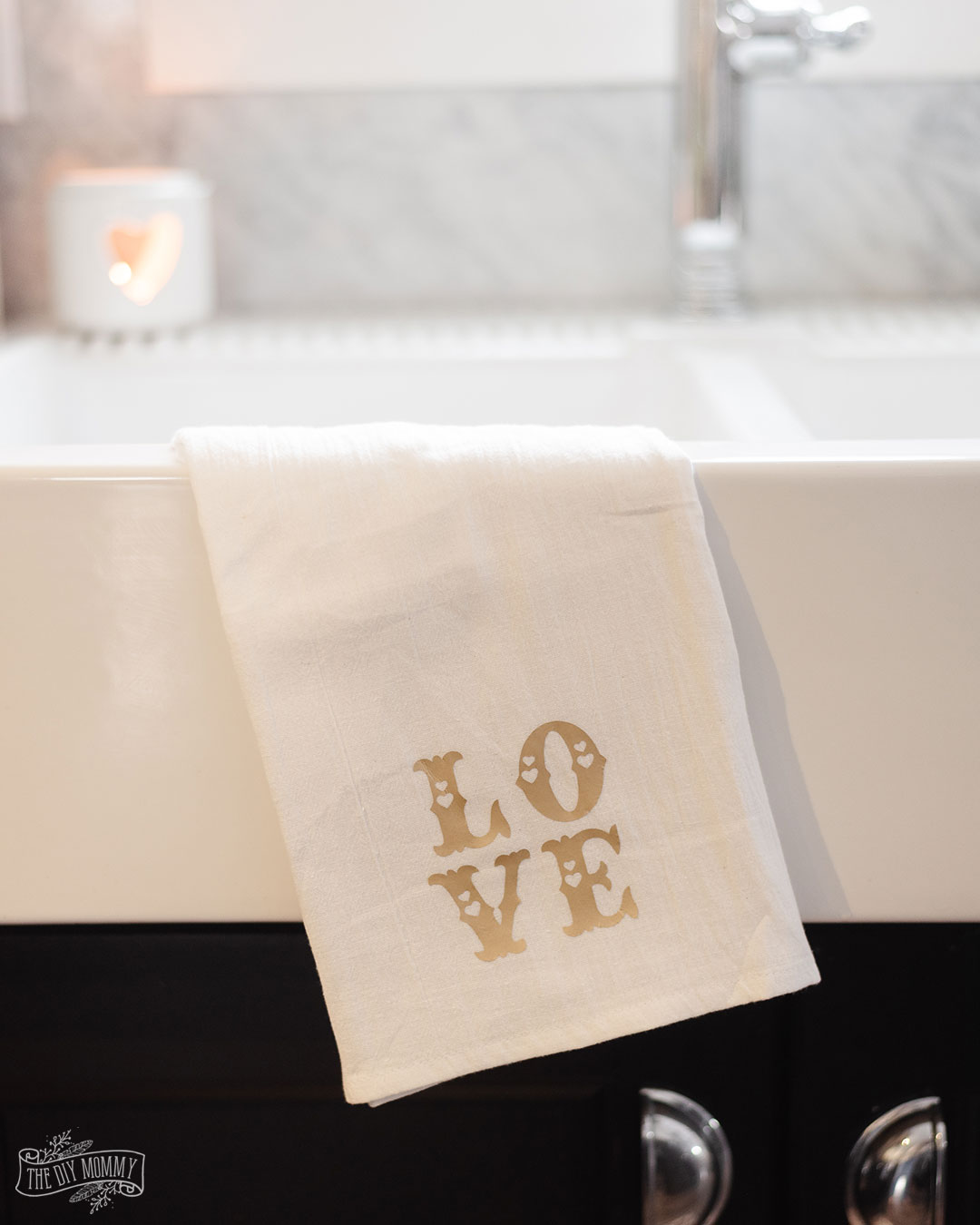 Learn how to create a simple DIY "LOVE" tea towel and get easy, neutral Valentine's Day decorating ideas for the kitchen