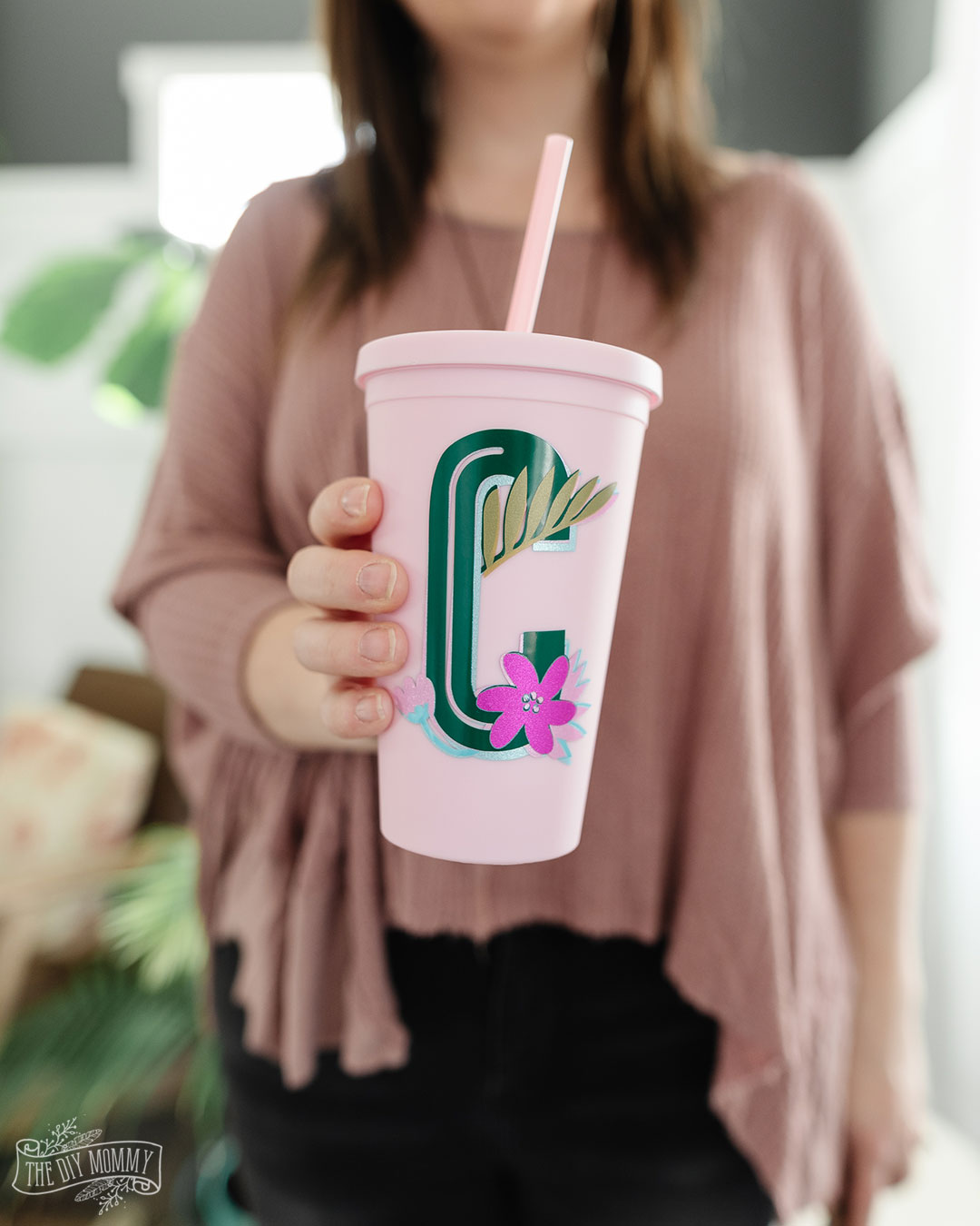 Learn how to make a DIY floral monogram tumbler with a Cricut machine!