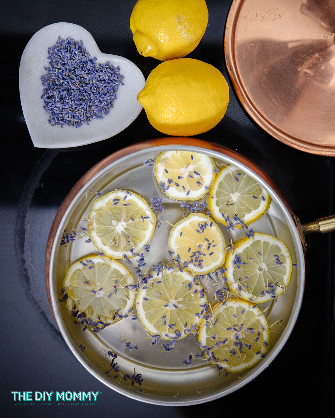 lemons and herbs added to a simmer pot
