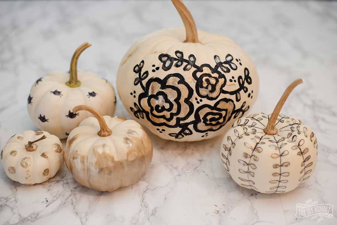 Black and gold painted pumpkins