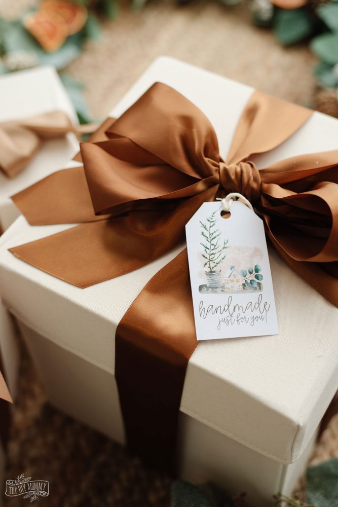 Looking for some free printable Christmas gift tags? You might just LOVE these ones! They feature cozy images and subtle shades of green and neutral tones to complement any nature-inspired, Cottagecore Christmas.
