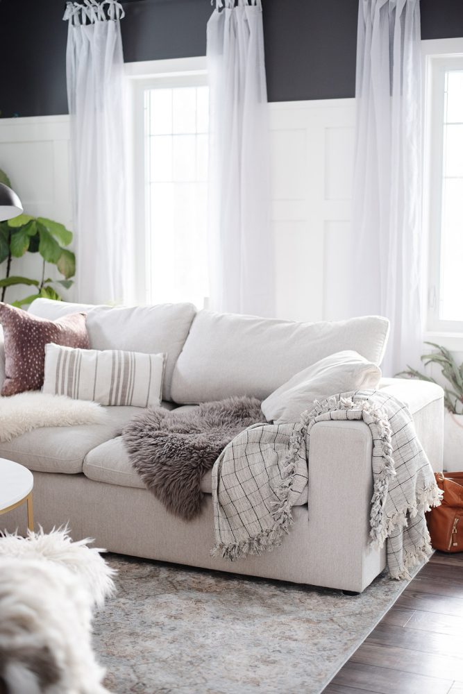 Make your home feel warm and cozy in January with furry textiles, soft colors and warm glowing lights.