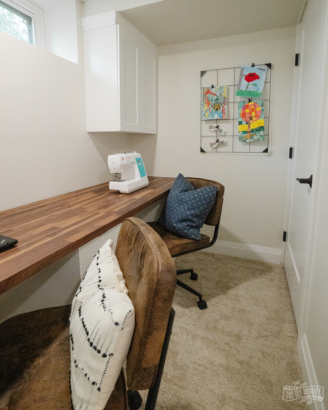 wooden desk and 2 chairs in the basement makeover