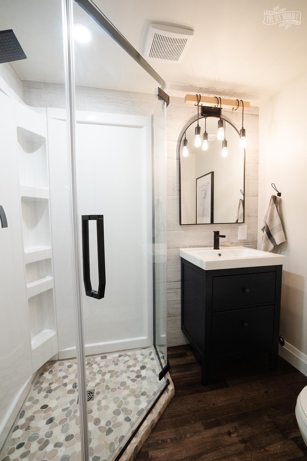 Before & After: Basement Storage Closet to Tiny Bathroom!