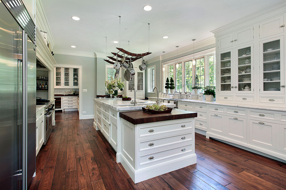 kitchen cabinets with wood floors and wood