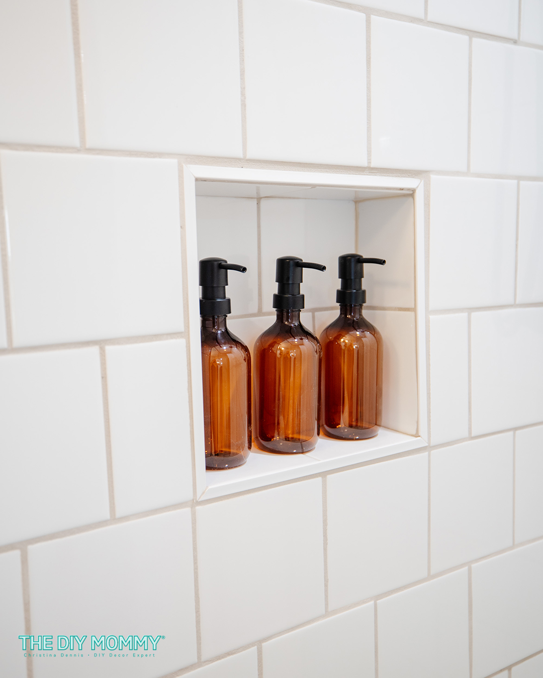 3 brown opaque soap/shampoo dispensing bottles with black pumps displayed in a shower. Could also be used as kitchen soap dispensers