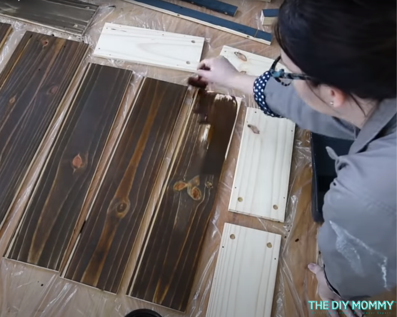 Using an age accelerator wood stain on the front and sides of the drawers