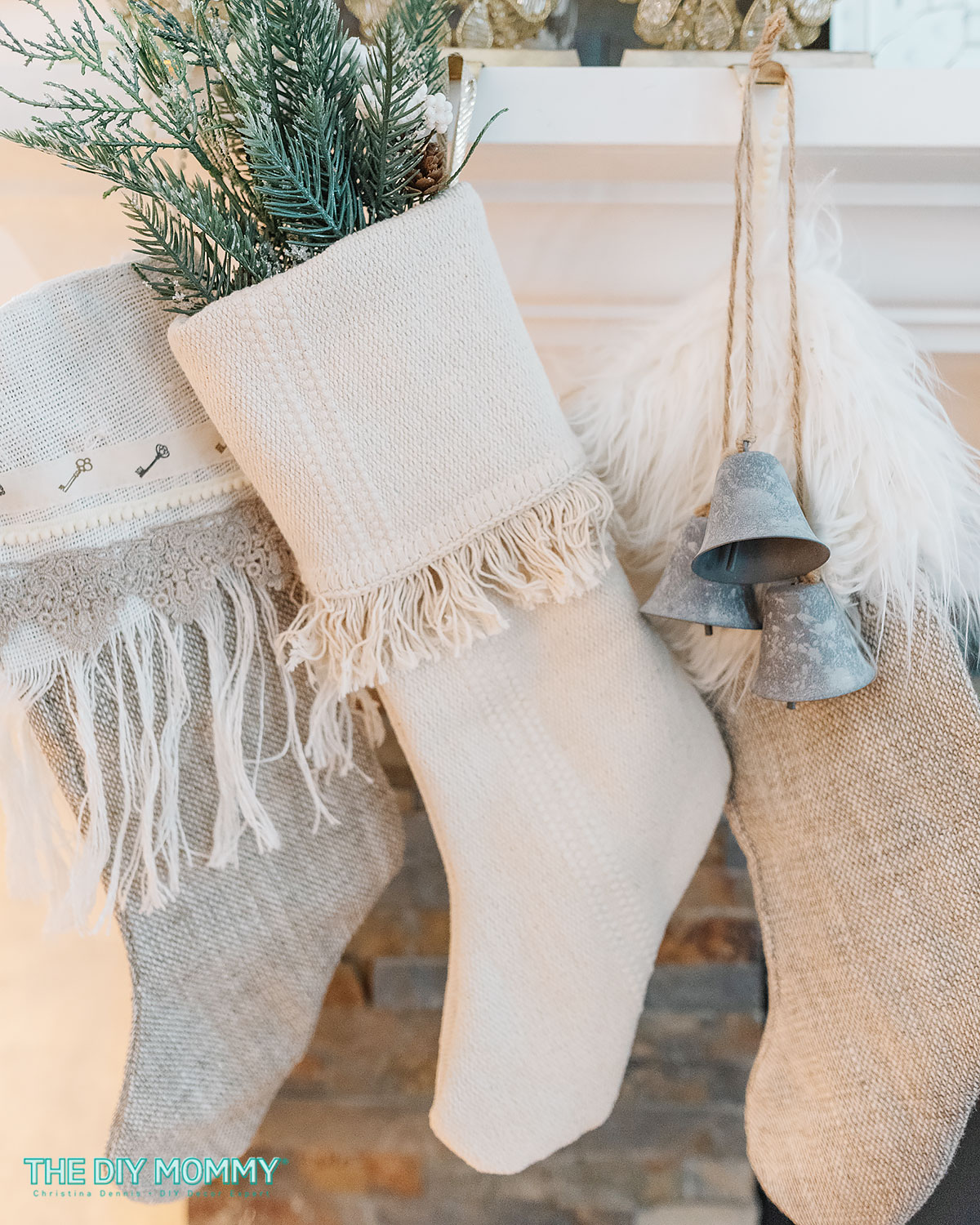 Fringed DIY Christmas stockings hang from the mantel